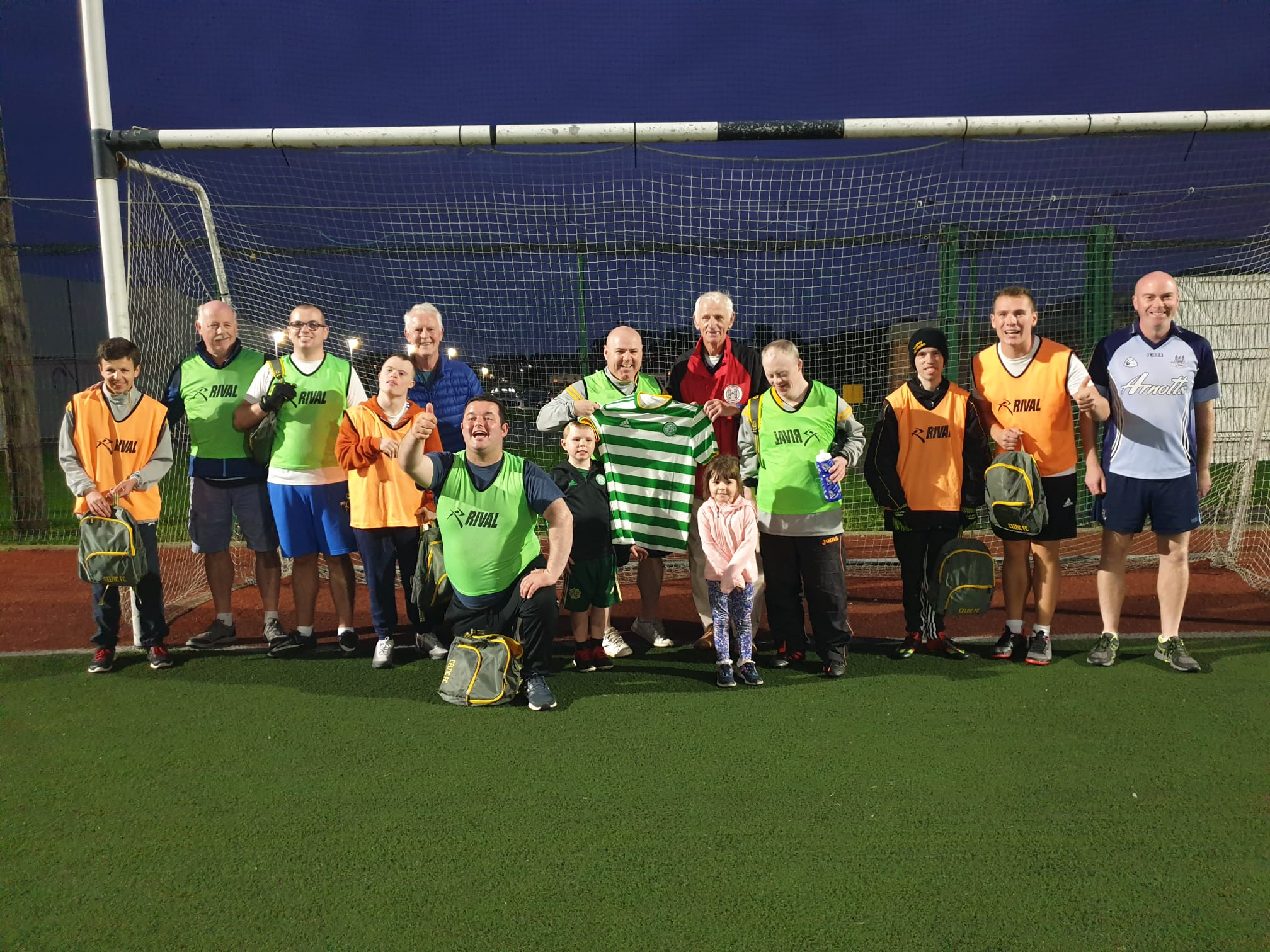 Members of Naomh Mearnog Special Needs GAC pose with their new Celtic kit bought with Trust-donated £50 vouchers.